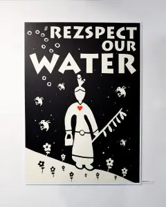 1 print of artwork by Bomgiizhik Isaac Murdoch on a white gallery wall.